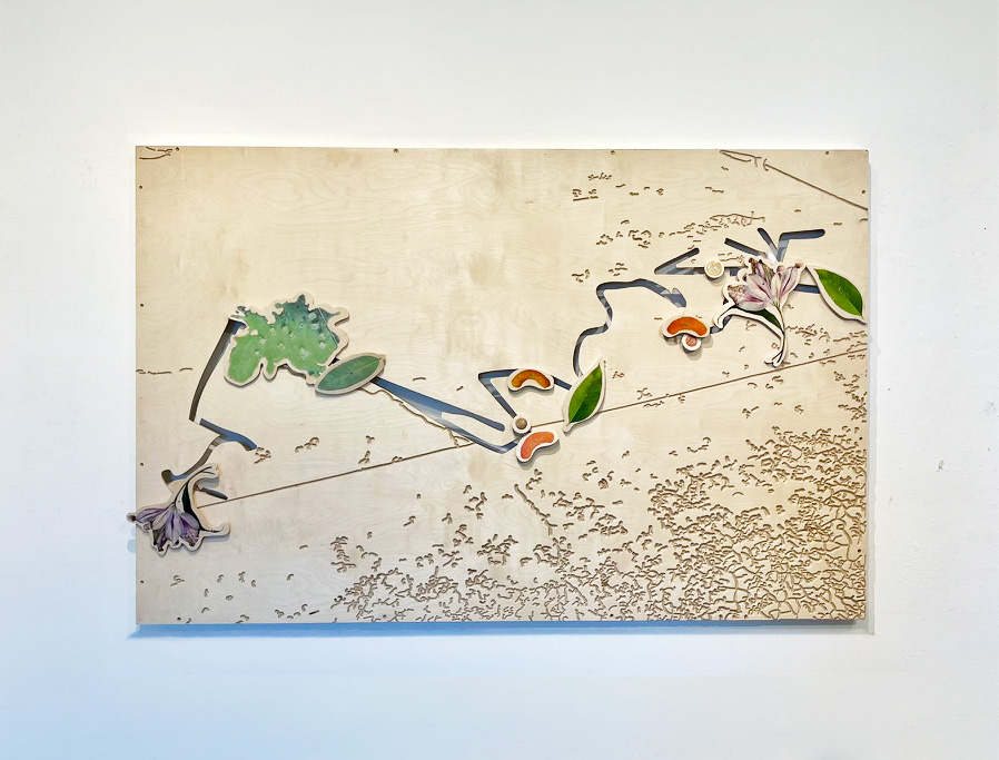 An artwork that looks like spilled shapes on a sidewalk