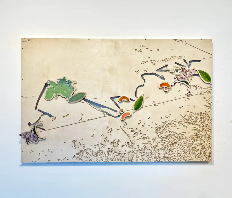An artwork that looks like spilled shapes on a sidewalk