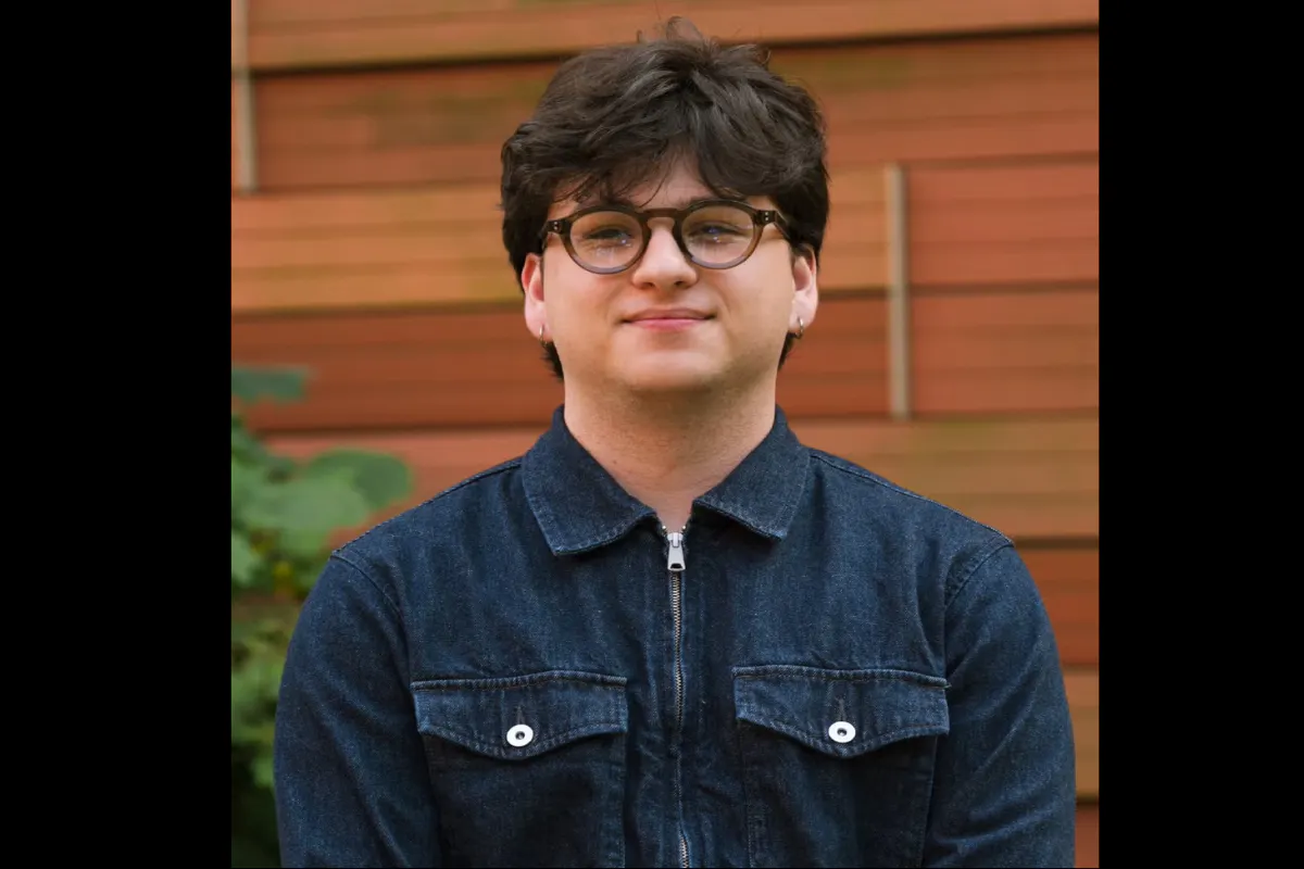 Portrait of Jude Fucatola, He is wearing a dark blue shirt