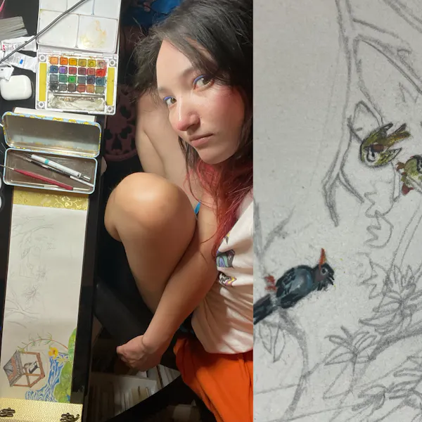 A young woman working with watercolors