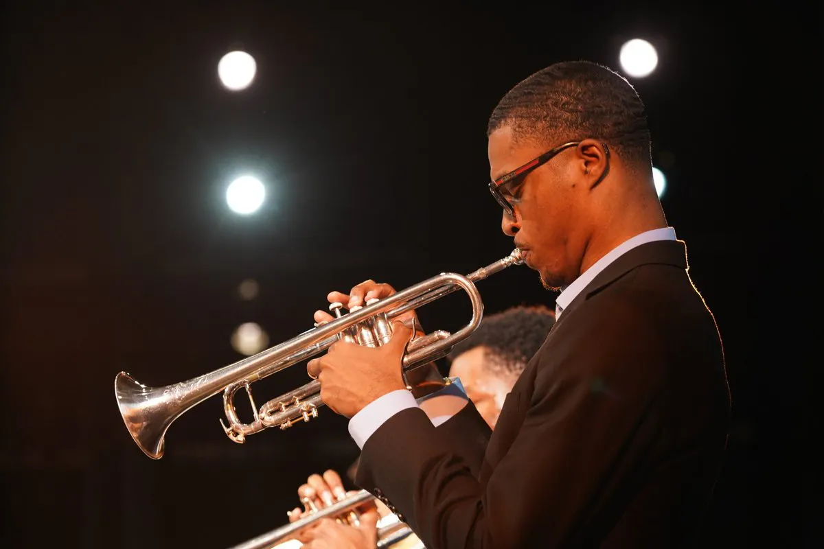 Closeup of a trumpet player performing onstage