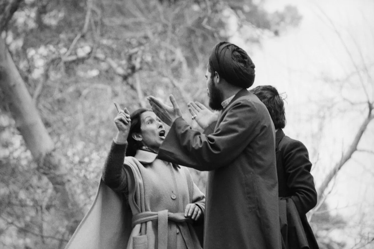 A woman and man arguing with each other.