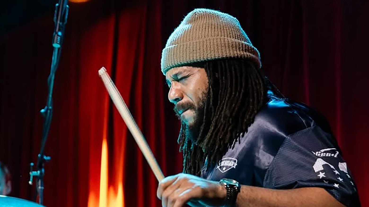 Closeup of a drummer with an intense expression