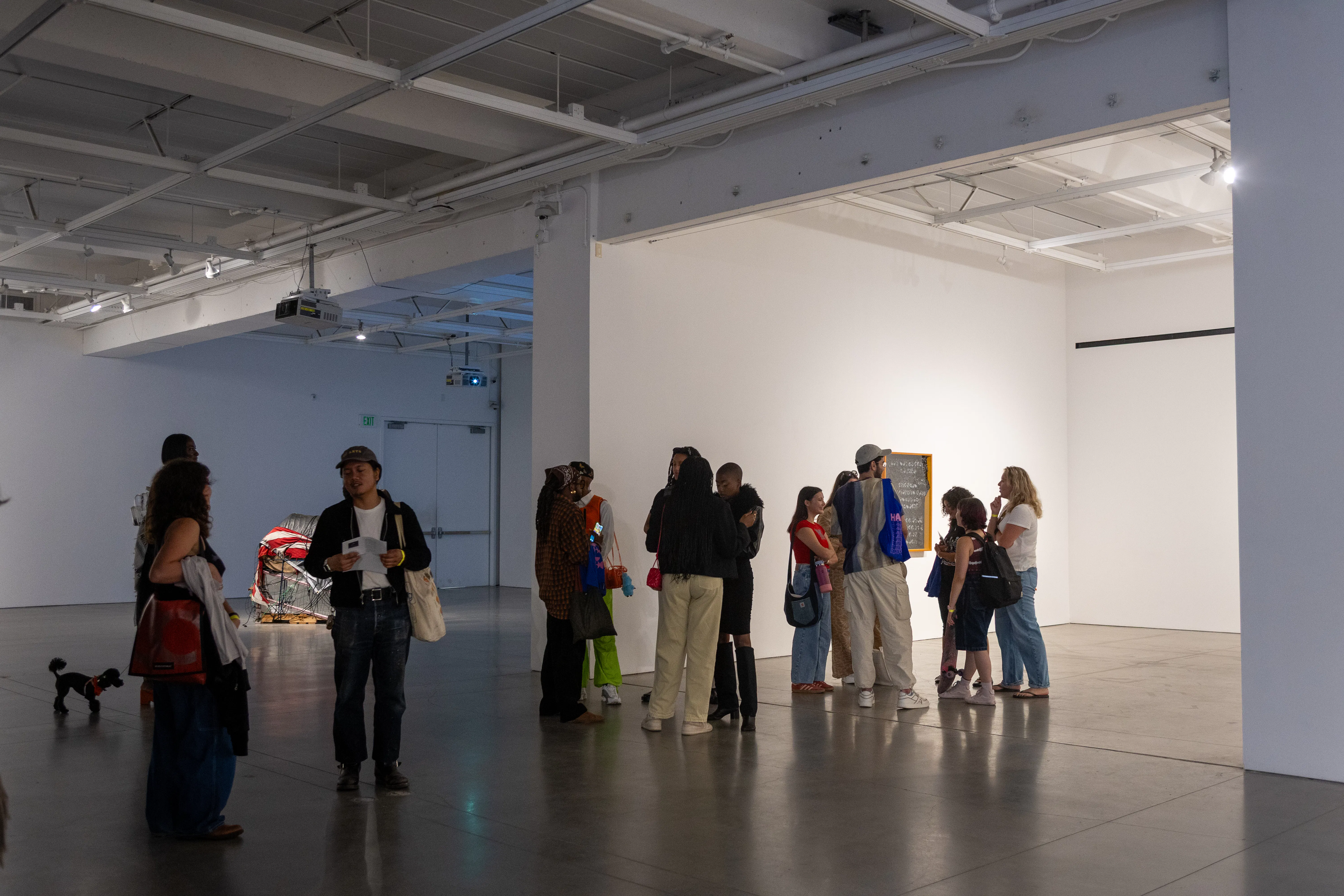 People mill around the spaces of the New wight gallery at UCLA