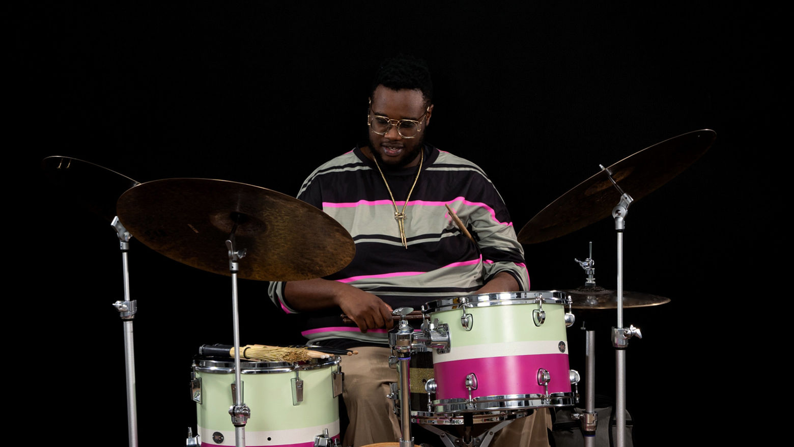A drummer performs on his drumkit