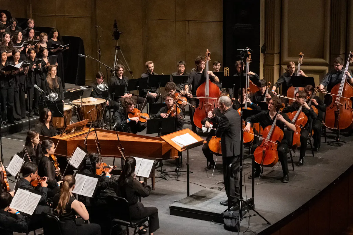 Orchestra and choir performers together on stage
