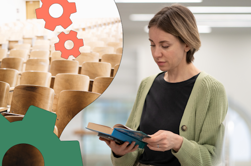 Woman standing up reading a book