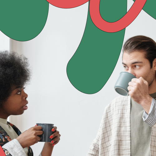 Two workmates having a coffee and talking, representing boundaries at work