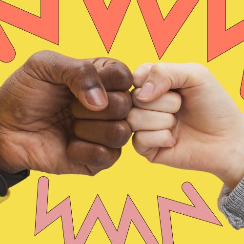 Two hands fist bumping