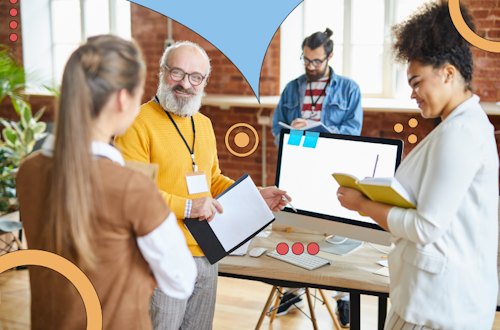 A group of people talking in an office, representing interpersonal skills