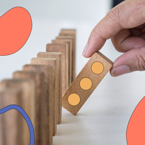 Person picking a domino out of a line