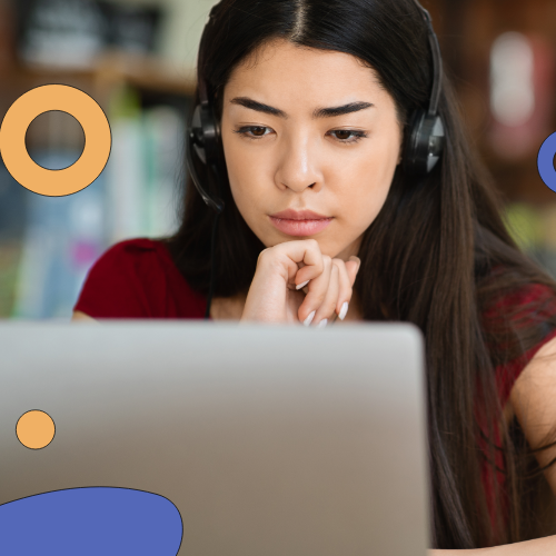 Woman focussing on her laptop screen