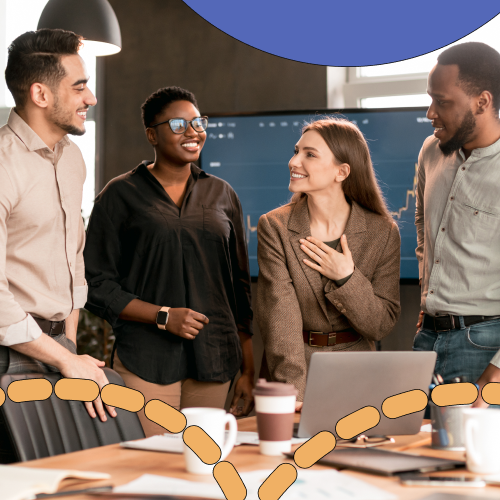 Group of people in a meeting room conversing