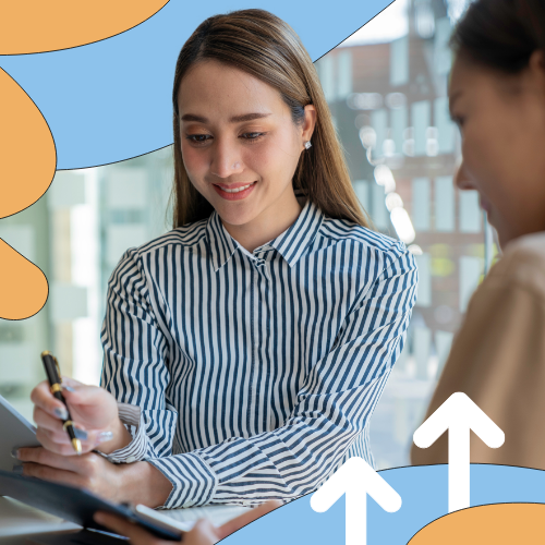 Two women taking notes, representing professional development