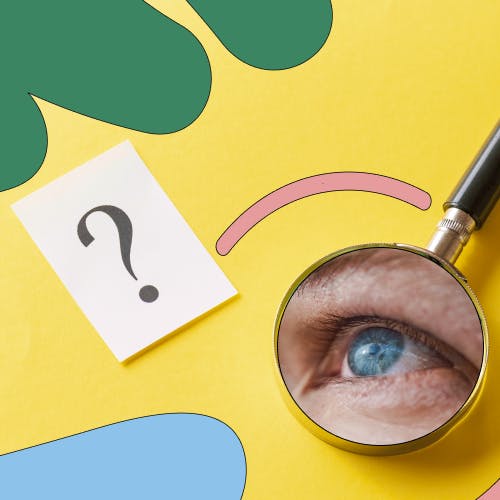Eye looking into a magnifying glass, next to a question mark on a white piece of paper