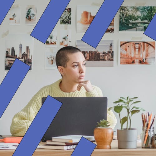 Worker at home office desk looking away