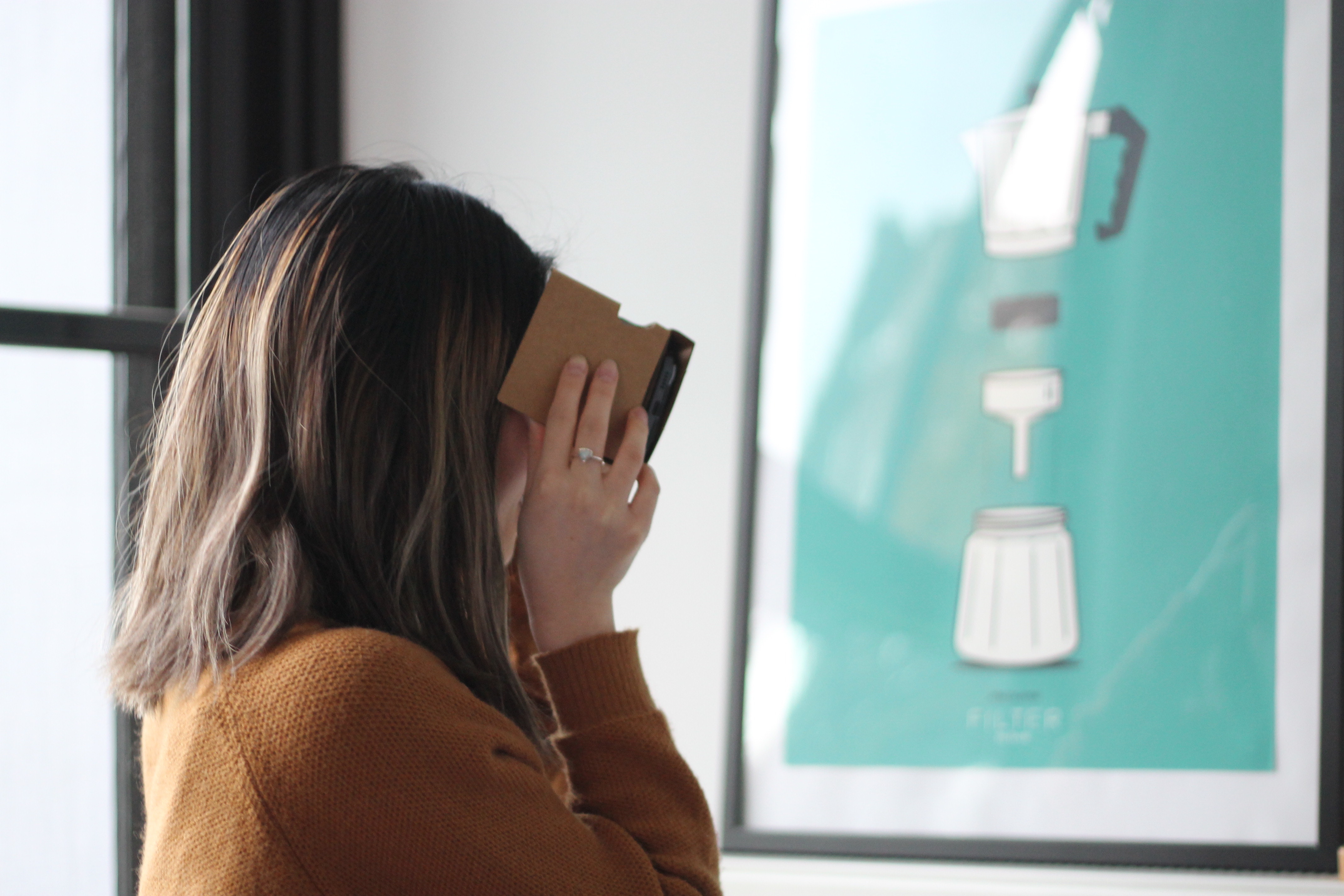 Woman taking a picture with her smartphone to symbolise developing skills for the future