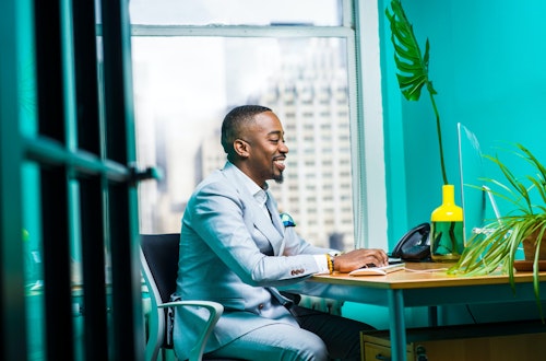 Man working and learning in his office