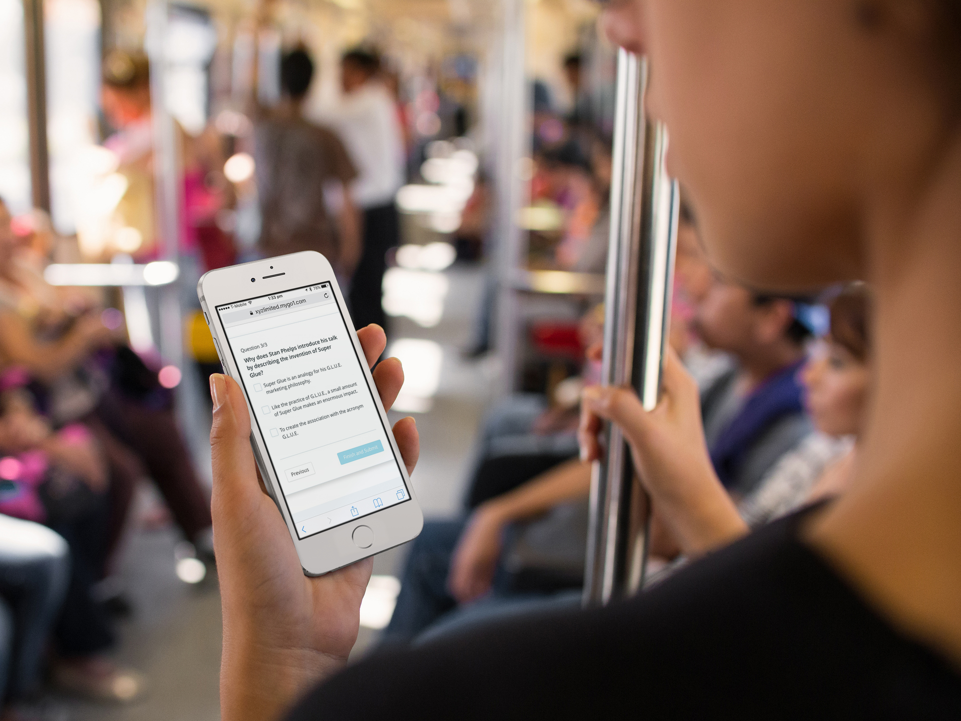 Person standing on the train holding their phone