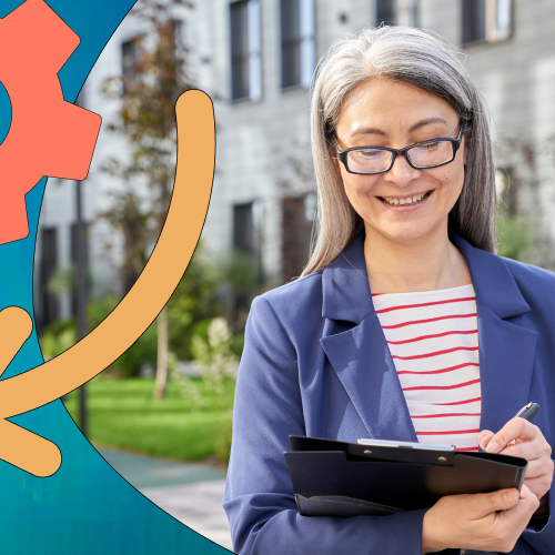 Woman with glasses standing outside, looking at a clipboard