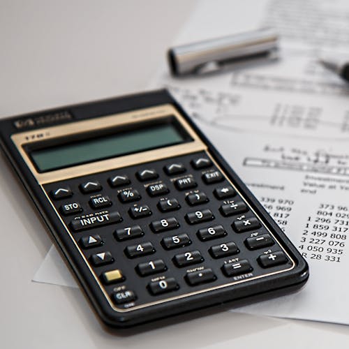 Calculator, pen, and other budgetary equipment