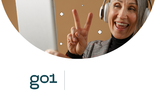 Person smiling and giving the peace sign with a Go1 logo