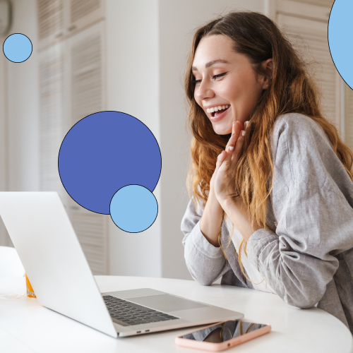 Woman smiling at laptop 