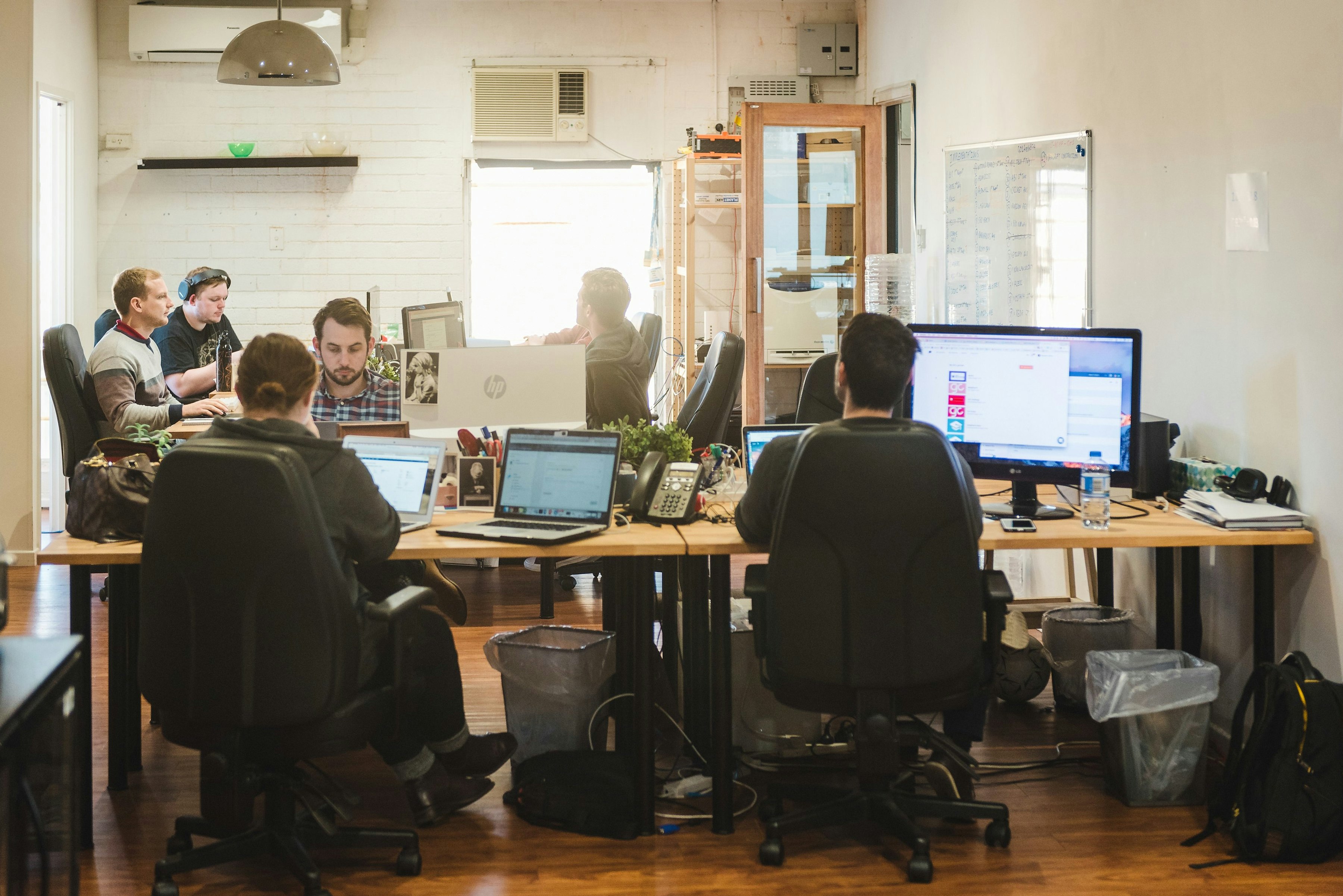 A group of workers in an office