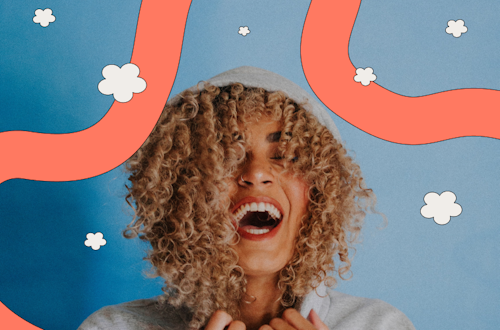 Head shot of woman with curly hair smiling