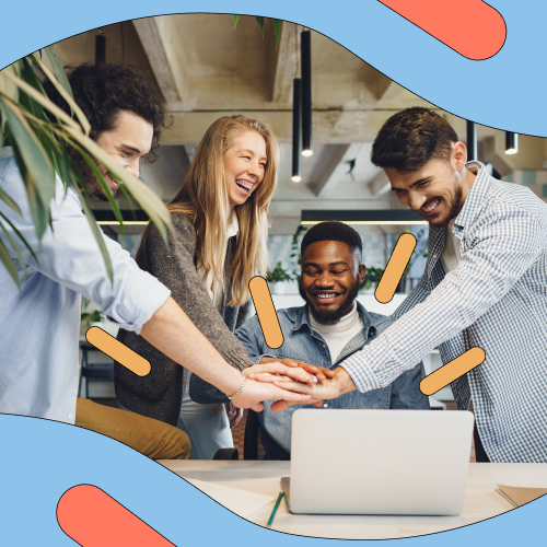 Happy and productive team gather around laptop