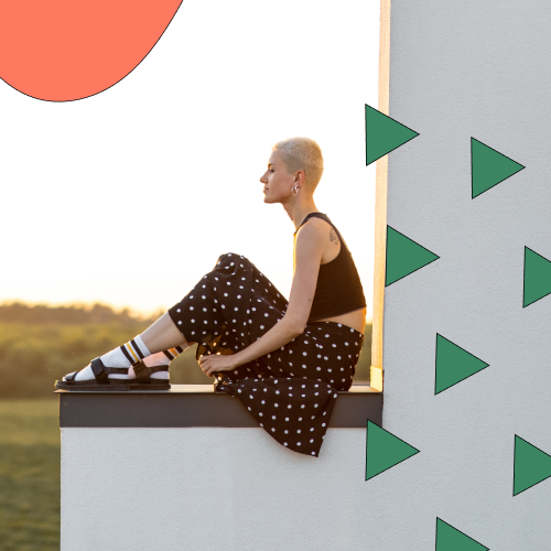 Woman sitting admiring landscape view 