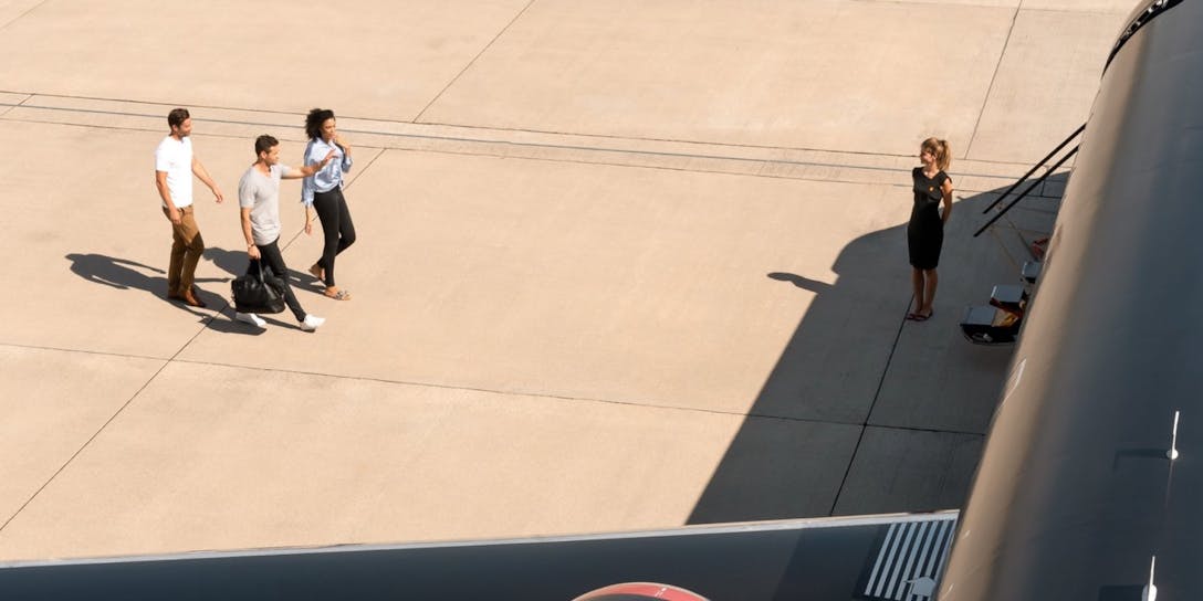 3 passengers boarding the jet