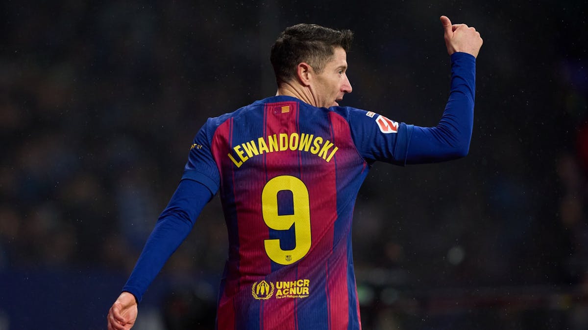 Robert Lewandowski wearing the number 9 Barcelona jersey