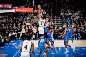 Wembanyama dunking on Chet Holmgrem