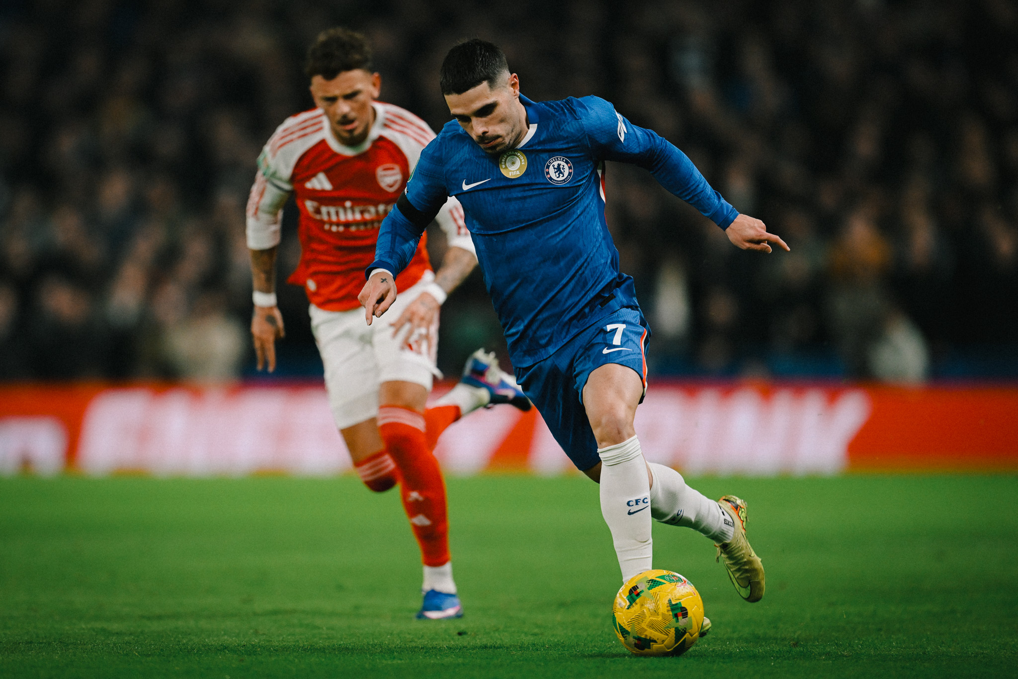 Gabriel Martinelli pictured alongside Pedro Neto during Carabao cup semi-final at Stamford Bridge