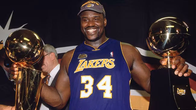 Shaq with the NBA Title and FMVP trophy