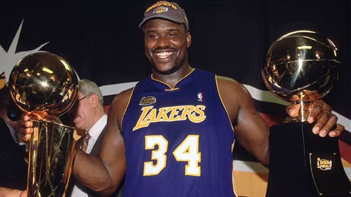 Shaq with the NBA Title and FMVP trophy