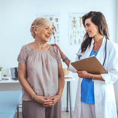 Elder patient with physician