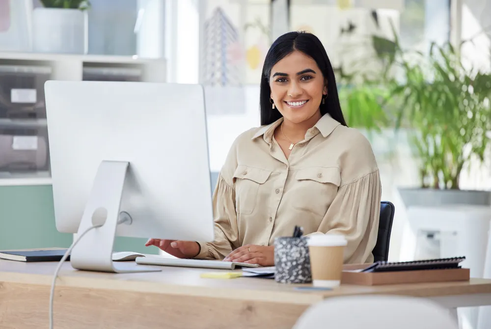 Woman on computer desk
