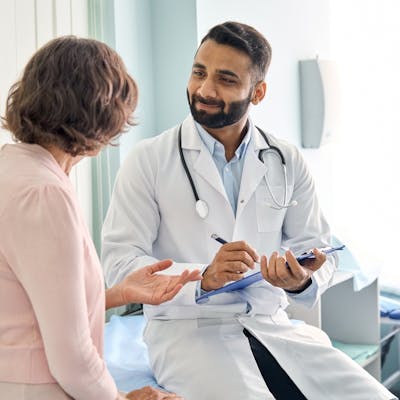 Patient talking to physician