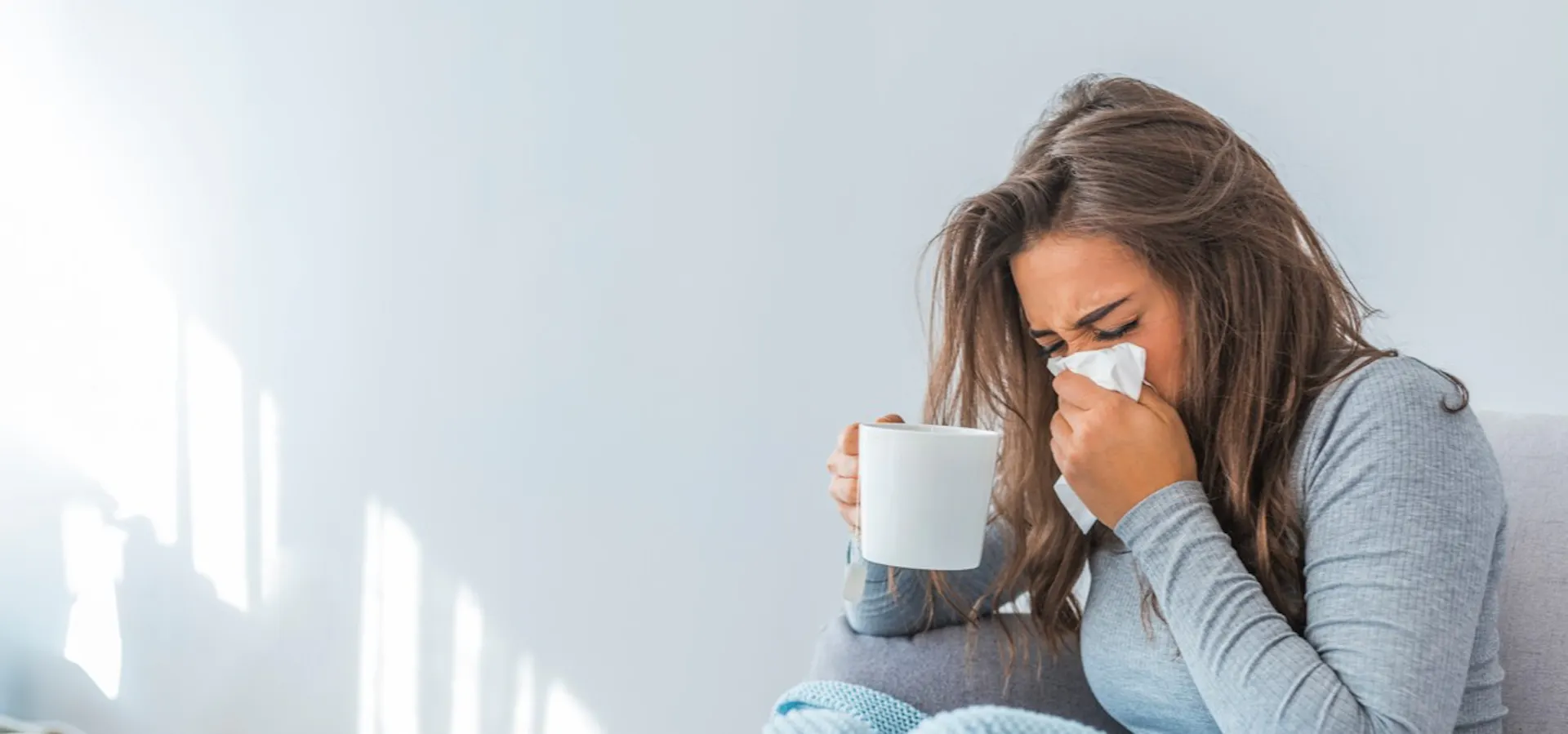 A woman suffering from a cold