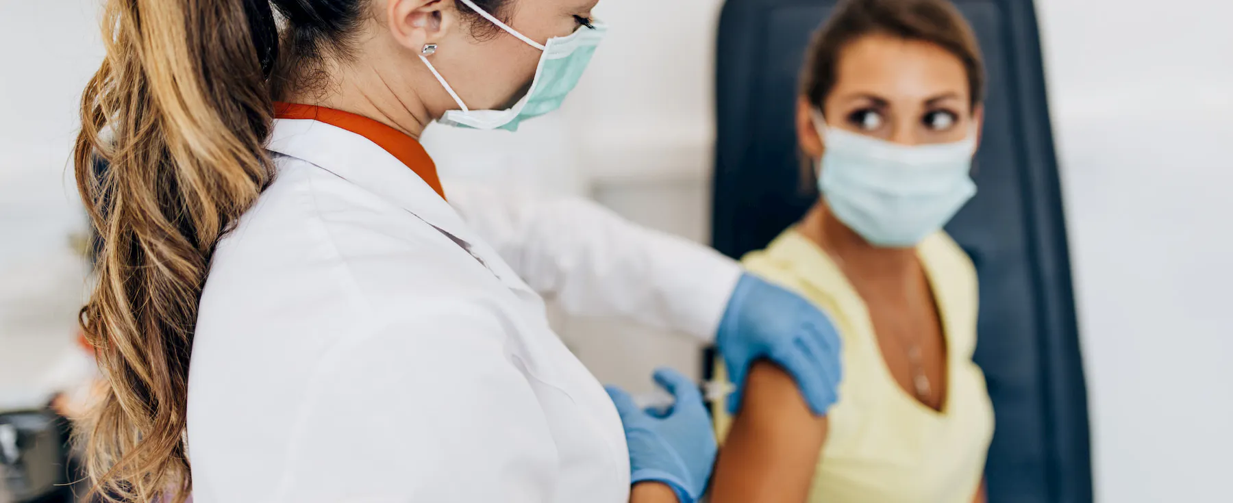 A woman getting a flu shot