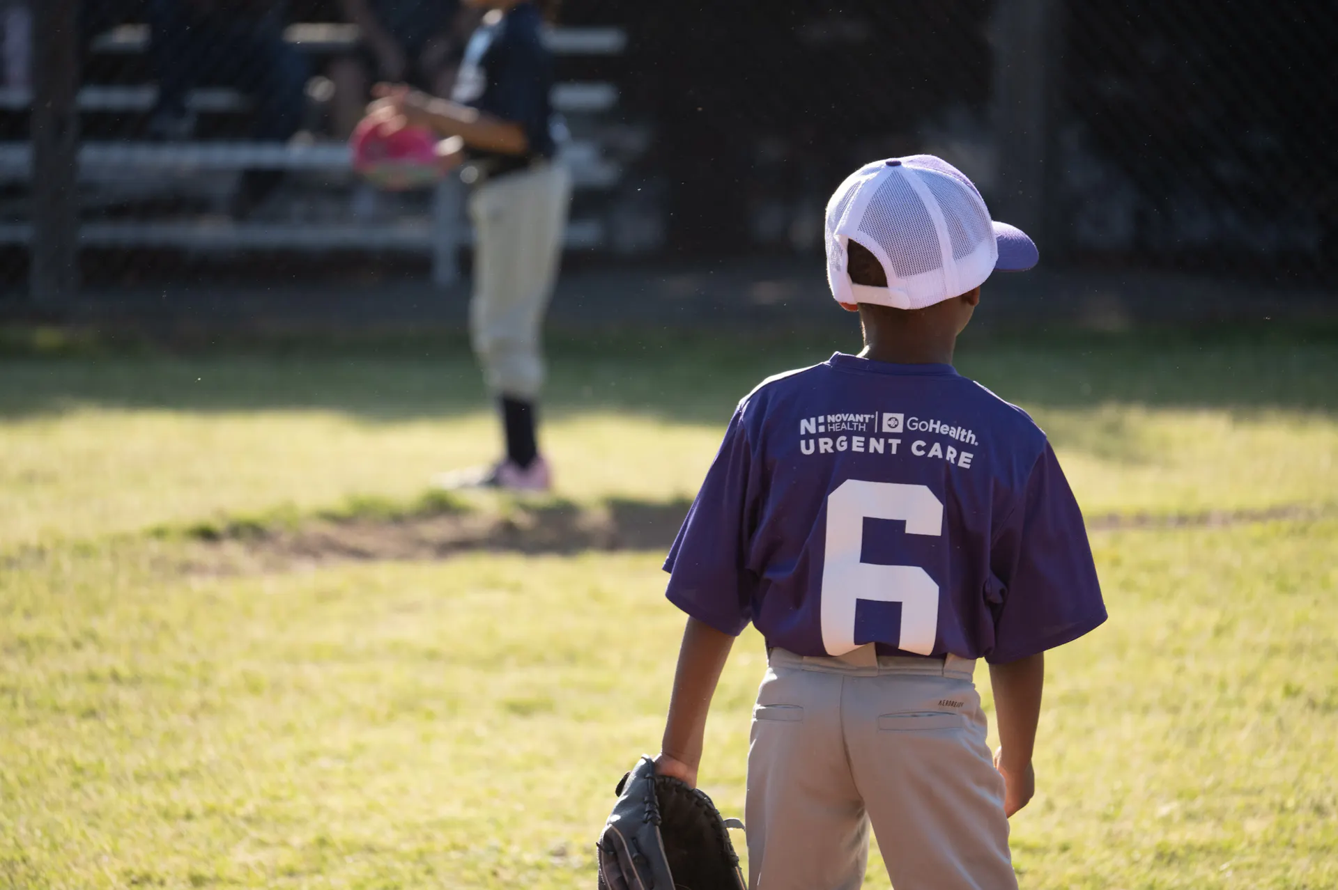 Novant Health-GoHealth child playing baseball