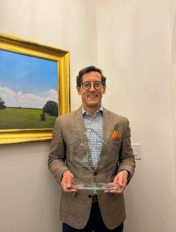 Georgia Fast 40 Winner - GoHealth Urgent Care CEO Todd Latz holding the trophy 