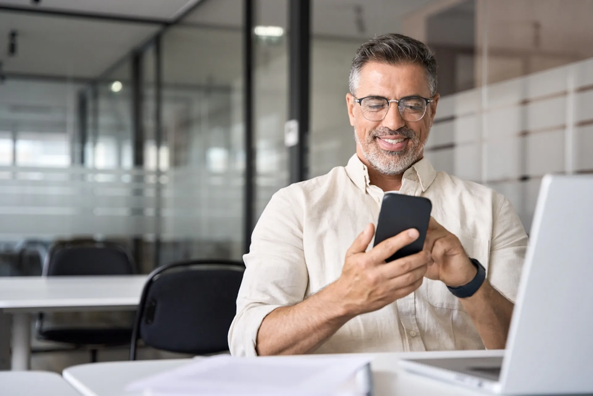 Man sitting down on phone