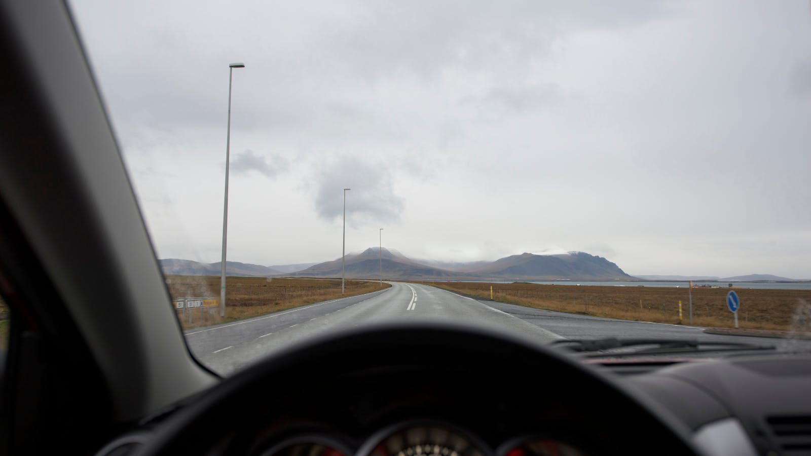 The view over a steering wheel in a 4x4 in Iceland.