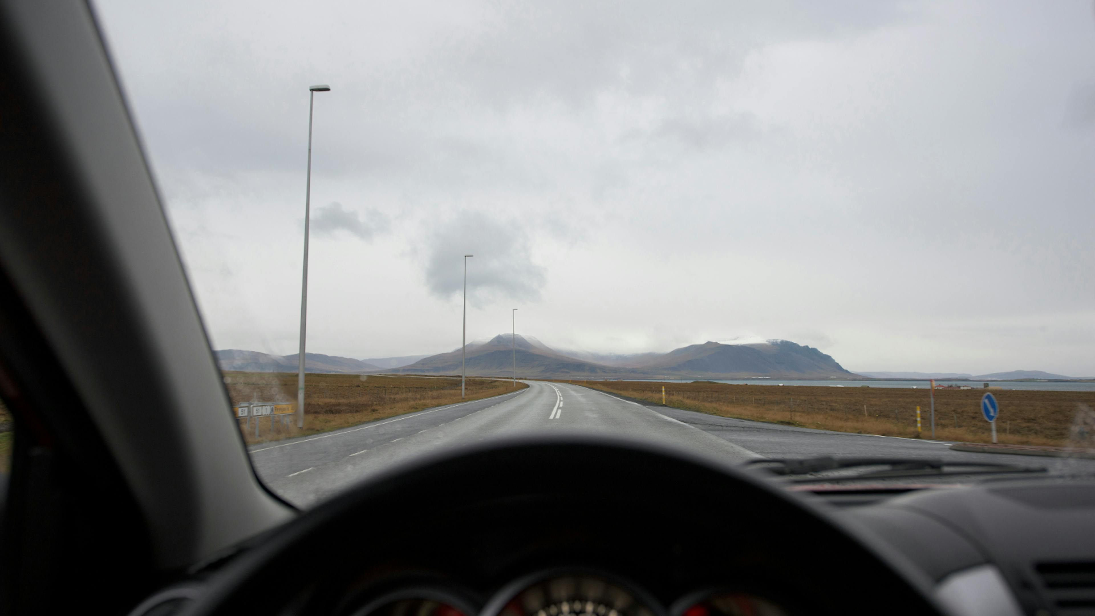 The view over a steering wheel in a 4x4 in Iceland.