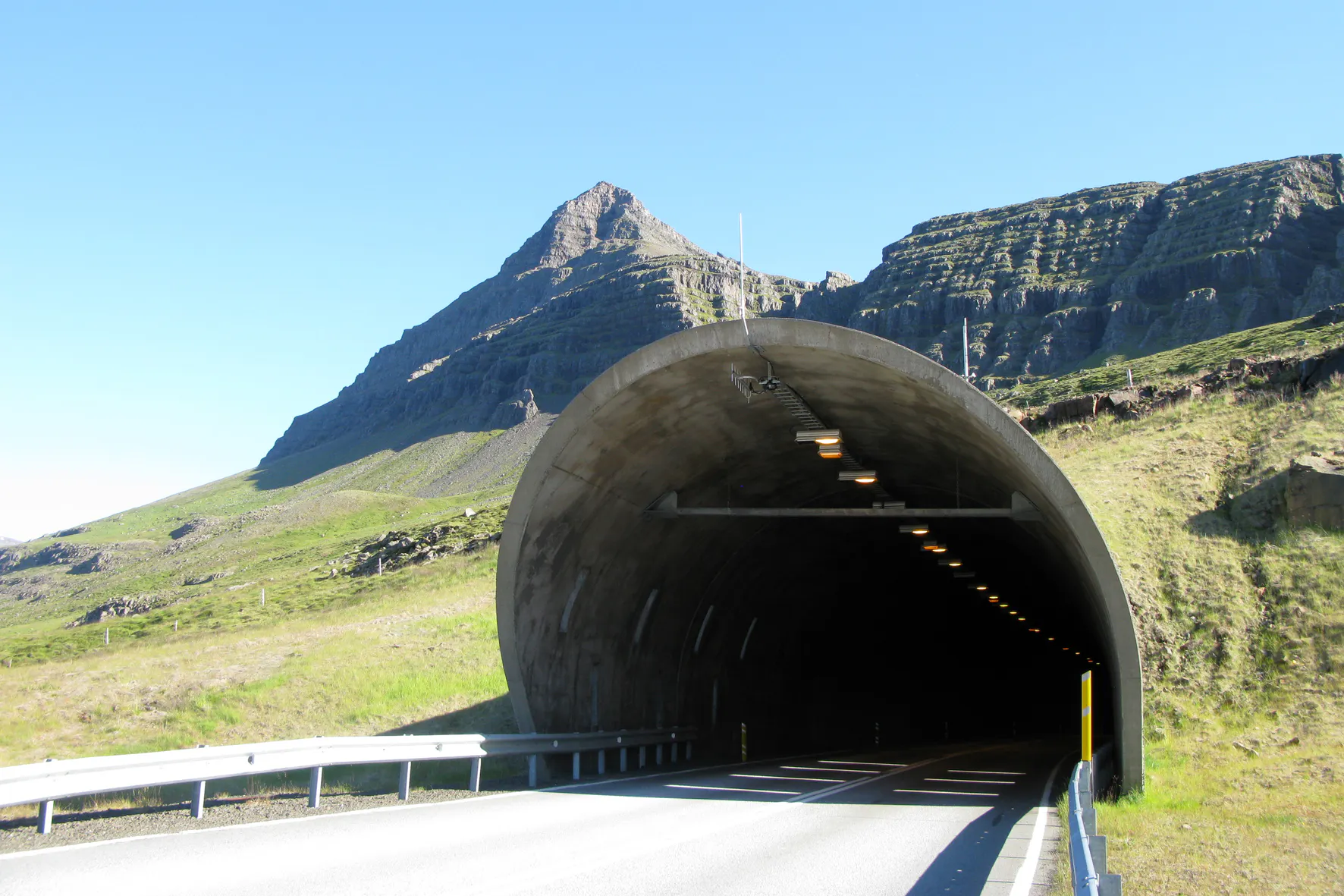 Oddsskarð tunnel in Iceland on a sunny day