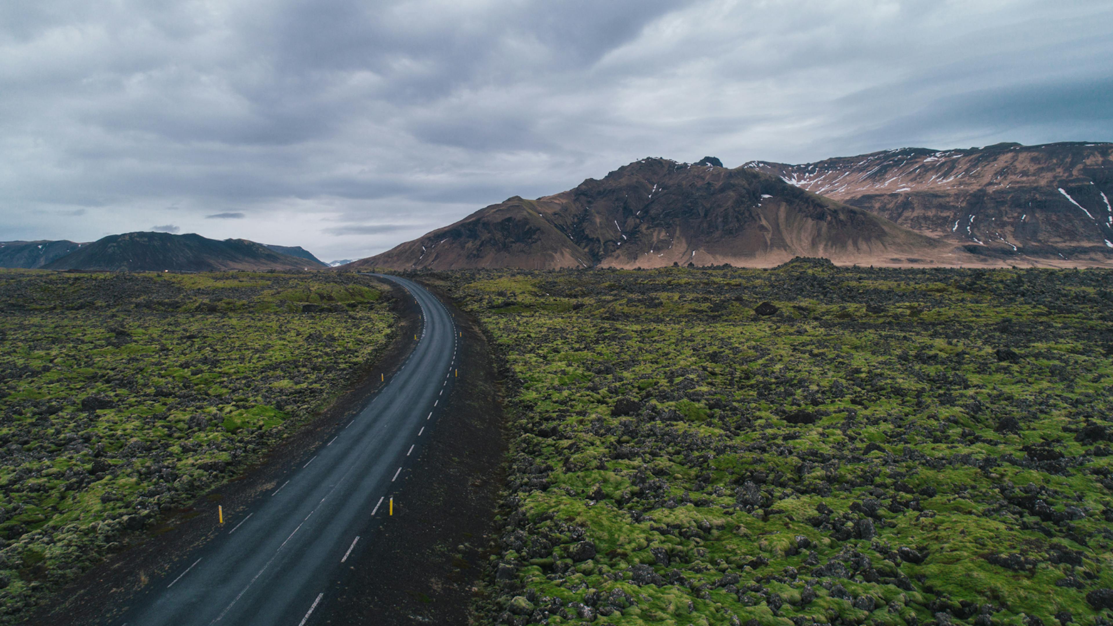 Road through a dramatic landscape in Iceland.