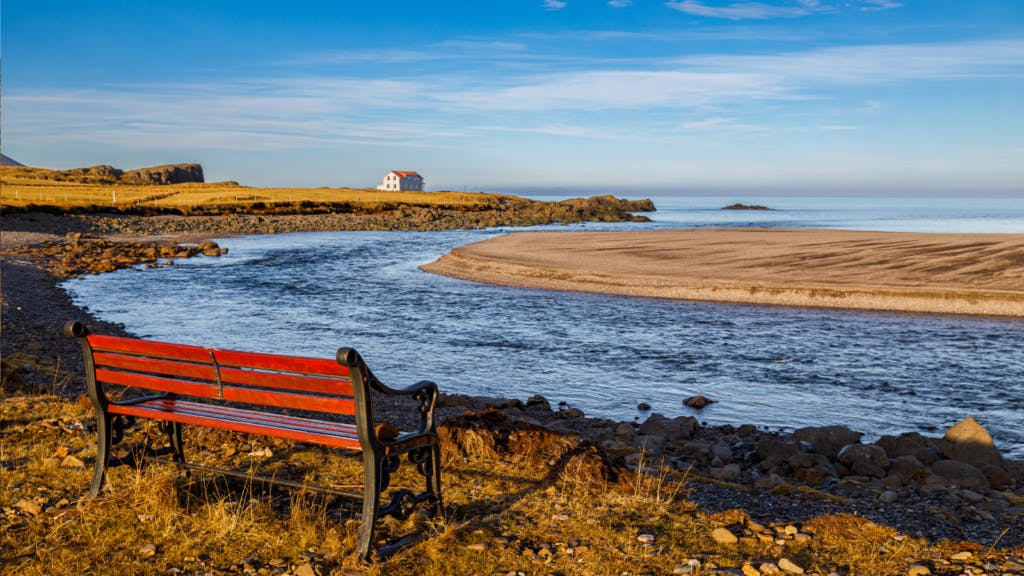 Bench overlooking the water in Borgarfjörður, Iceland.